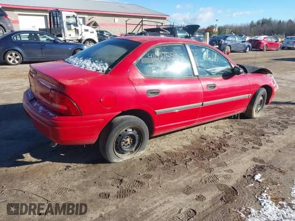 1996 Dodge Neon with VIN 1B3ES27C9TD532051, listed as a IAAI auction lot 41027554 with 116,517 mi miles and . Bid and sale history available at DreamBid. Image 4.