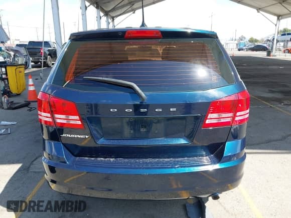 2015 Dodge Journey SE with VIN 3C4PDCAB8FT587824, listed as a IAAI auction lot 43270692 with 123,419 mi miles and . Bid and sale history available at DreamBid. Image 17.