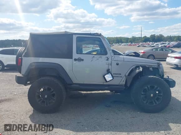 2013 Jeep Wrangler Sport with VIN 1C4AJWAG4DL661597, listed as a IAAI auction lot 43133496 with 80,714 mi miles and . Bid and sale history available at DreamBid. Image 13.