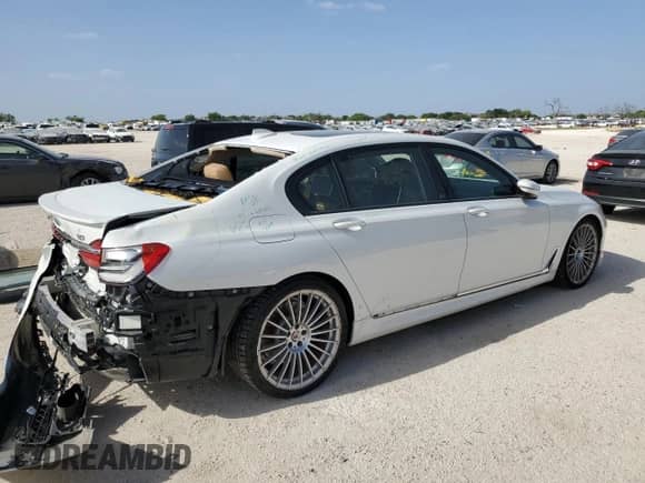 2019 BMW 7 Series with VIN WBA7F2C15KB242462, listed as a Copart auction lot 60916394 with 20,985 mi miles and Salvage title. Bid and sale history available at DreamBid. Image 3.