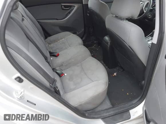 2013 Hyundai Elantra GLS z VIN 5NPDH4AE2DH305374, wystawiony jako IAAI lot #41138613 z przebiegiem 143 906 mil mil oraz . Historia ofert i sprzedaży dostępna na DreamBid. Obrazek 8.