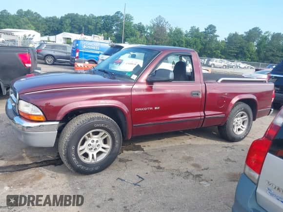 2002 Dodge Dakota с VIN 1B7FL46X82S624858, выставлен на аукционе IAAI как лот 42688838 с пробегом 142 883 миль миль и . История ставок и продаж доступна на DreamBid. Изображение 13.