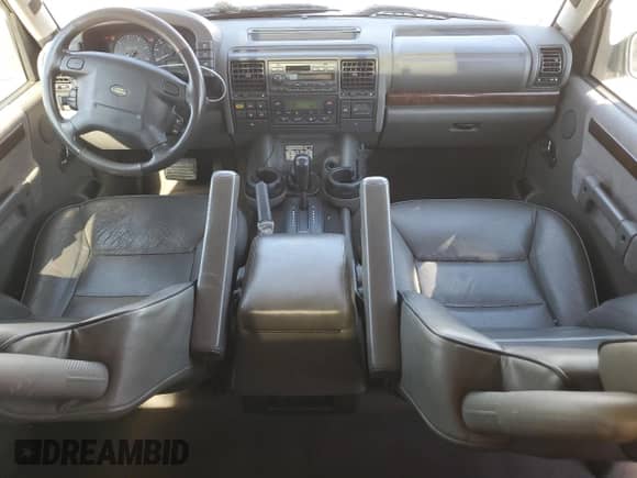 2002 Land Rover Discovery с VIN SALTW12412A748747, выставлен на аукционе Copart как лот 47189965 с пробегом 130 237 миль миль и Списание • Salvage title. История ставок и продаж доступна на DreamBid. Изображение 8.