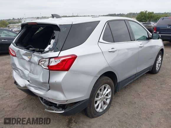 2018 Chevrolet Equinox LT with VIN 2GNAXJEV4J6285778, listed as a IAAI auction lot 43275955 with 84,159 mi miles and . Bid and sale history available at DreamBid. Image 4.