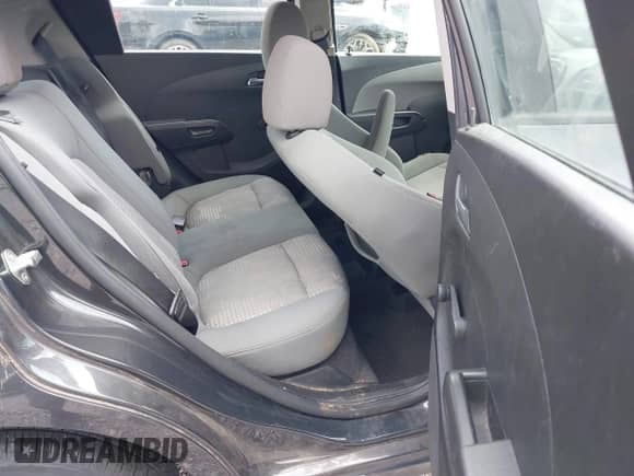 2014 Chevrolet Sonic LS with VIN 1G1JA6SH9E4146252, listed as a IAAI auction lot 42590935 with 143,413 mi miles and . Bid and sale history available at DreamBid. Image 8.