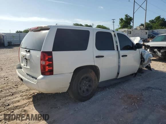 2010 Chevrolet Tahoe LS z VIN 1GNMCAE03AR224634, wystawiony jako Copart lot #61961605 z przebiegiem Nie podano mil oraz Szkoda całkowita • Salvage title. Historia ofert i sprzedaży dostępna na DreamBid. Obrazek 3.