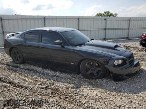 2009 Dodge Charger SXT с VIN 2B3KA33V49H514054, выставлен на аукционе Copart как лот 55347824 с пробегом 203 389 миль миль и Списание • Salvage title. История ставок и продаж доступна на DreamBid. Изображение 4.