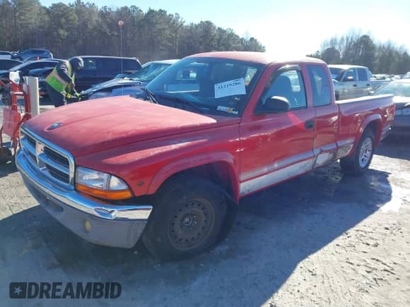2004 Dodge Dakota SLT with VIN 1D7GL42N24S589414, listed as a IAAI auction lot 41219286 with 145,851 mi miles and . Bid and sale history available at DreamBid. Image 2.