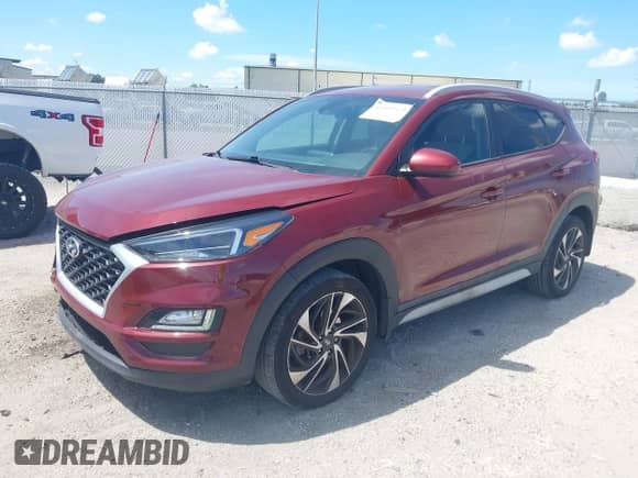 2020 Hyundai Tucson SEL with VIN KM8J33AL2LU137987, listed as a IAAI auction lot 42604454 with 80,374 mi miles and . Bid and sale history available at DreamBid. Image 2.