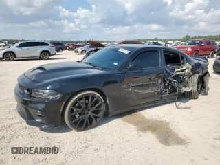 2020 Dodge Charger R/T with VIN 2C3CDXCT3LH176349, listed as a Copart auction lot 80027105 with 103,008 mi miles and Salvage title. Bid and sale history available at DreamBid. Image 1.