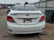 2014 Hyundai Accent GLS z VIN KMHCT4AE8EU684992, wystawiony jako Copart lot #41794524 z przebiegiem 86 089 mil mil oraz Szkoda całkowita • Salvage title. Historia ofert i sprzedaży dostępna na DreamBid. Obrazek 6.