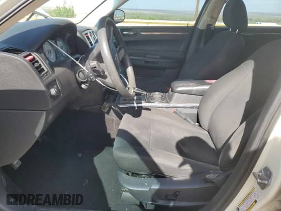 2009 Chrysler 300 LX with VIN 2C3KA43D49H577686, listed as a Copart auction lot 53002035 with 239,337 mi miles and Salvage title. Bid and sale history available at DreamBid. Image 7.