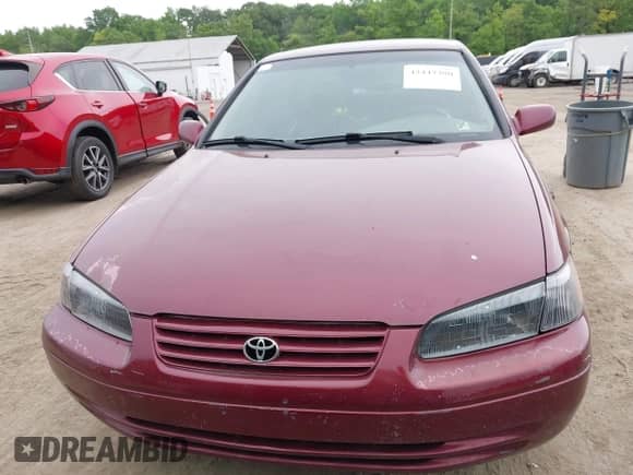1997 Toyota Camry LE z VIN 4T1BF22K8VU005878, wystawiony jako IAAI lot #42447380 z przebiegiem 180 256 mil mil oraz . Historia ofert i sprzedaży dostępna na DreamBid. Obrazek 12.
