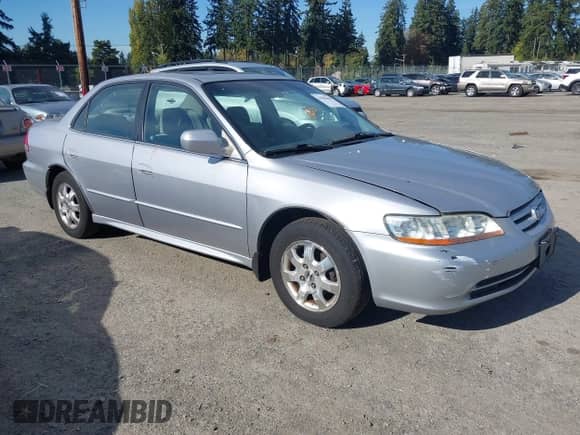2001 Honda Accord EX with VIN JHMCG566X1C028324, listed as a IAAI auction lot 43502630 with 197,154 mi miles and . Bid and sale history available at DreamBid. Image 1.