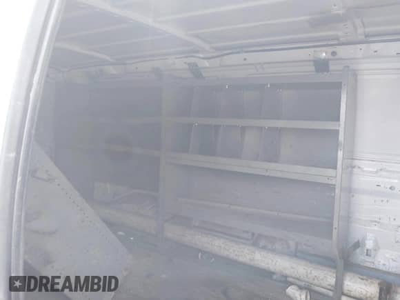 2006 Ford Econoline Cargo with VIN 1FTNE24W06DB34266, listed as a IAAI auction lot 43136272 with 258,950 mi miles and . Bid and sale history available at DreamBid. Image 8.