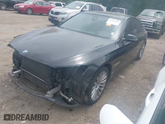 2015 BMW 7 Series 740i с VIN WBAYA6C51FGK16690, выставлен на аукционе IAAI как лот 42295559 с пробегом Не указан миль и . История ставок и продаж доступна на DreamBid. Изображение 2.