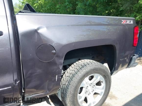 2016 Chevrolet Silverado 1500 LT with VIN 3GCUKRECXGG137939, listed as a IAAI auction lot 42653649 with 122,925 mi miles and . Bid and sale history available at DreamBid. Image 19.