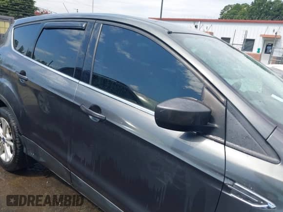 2017 Ford Escape SE with VIN 1FMCU9G93HUC52514, listed as a IAAI auction lot 43133799 with 141,616 mi miles and . Bid and sale history available at DreamBid. Image 13.