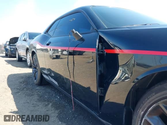 2019 Dodge Challenger GT with VIN 2C3CDZJG0KH749966, listed as a IAAI auction lot 43181406 with 59,571 mi miles and . Bid and sale history available at DreamBid. Image 18.