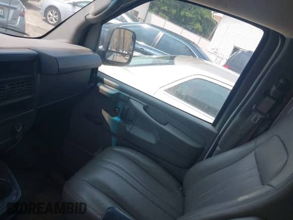 2011 Chevrolet Express Cargo with VIN 1GCSGAFX2B1112312, listed as a IAAI auction lot 42374896 with 140,571 mi miles and . Bid and sale history available at DreamBid. Image 5.