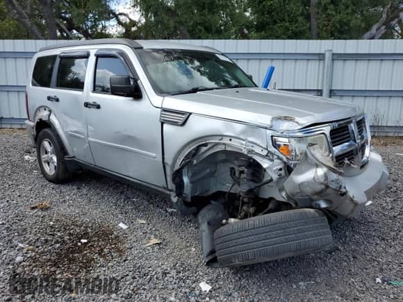 2008 Dodge Nitro SXT with VIN 1D8GU28K48W129101, listed as a Copart auction lot 85730735 with 211,507 mi miles and Salvage title. Bid and sale history available at DreamBid. Image 4.