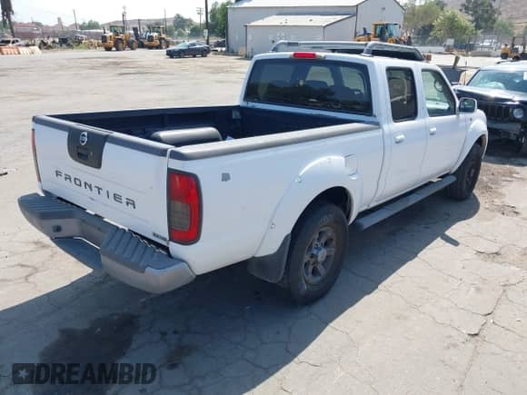 2003 Nissan Frontier XE with VIN 1N6ED29X83C450257, listed as a IAAI auction lot 42593725 with 221,800 mi miles and . Bid and sale history available at DreamBid. Image 4.
