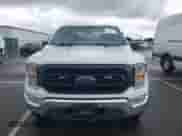 2021 Ford F-150 XL z VIN 1FTEX1EP8MKD33988, wystawiony jako IAAI lot #43336155 z przebiegiem 124 656 mil mil oraz . Historia ofert i sprzedaży dostępna na DreamBid. Obrazek 12.
