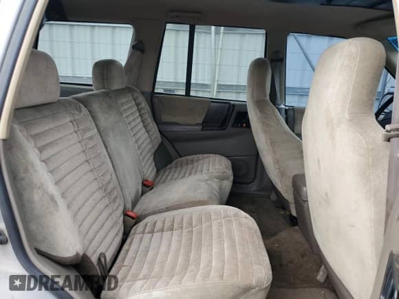 1995 Jeep Grand Cherokee Laredo with VIN 1J4GZ58S2SC703196, listed as a Copart auction lot 68571944 with 264,876 mi miles and Clean title. Bid and sale history available at DreamBid. Image 11.