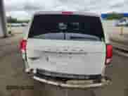 2013 Dodge Grand Caravan American Value with VIN 2C4RDGBG6DR765319, listed as a Copart auction lot 69782895 with 129,861 mi miles and Salvage title. Bid and sale history available at DreamBid. Image 6.