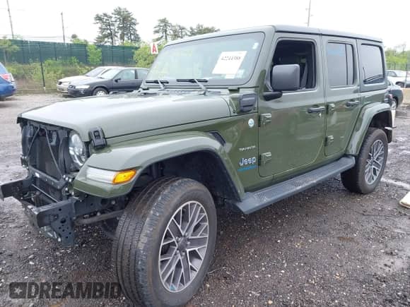 2023 Jeep Wrangler Sahara with VIN 1C4JJXP64PW684210, listed as a IAAI auction lot 42244388 with 23,622 mi miles and . Bid and sale history available at DreamBid. Image 2.