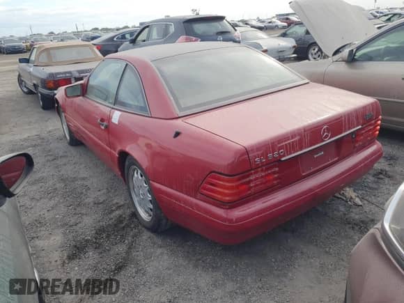 1997 Mercedes-Benz SL 500 с VIN WDBFA63F1VF144556, выставлен на аукционе Copart как лот 74490744 с пробегом Не указан миль и Списание • Salvage title. История ставок и продаж доступна на DreamBid. Изображение 2.