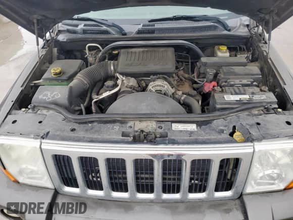 2006 Jeep Commander with VIN 1J8HH48NX6C106832, listed as a Copart auction lot 60544515 with 170,404 mi miles and Clean title. Bid and sale history available at DreamBid. Image 11.