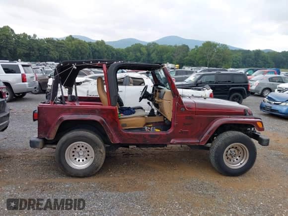 1998 Jeep Wrangler SE with VIN 1J4FY29PXWP794854, listed as a IAAI auction lot 42929258 with 235,517 mi miles and . Bid and sale history available at DreamBid. Image 14.