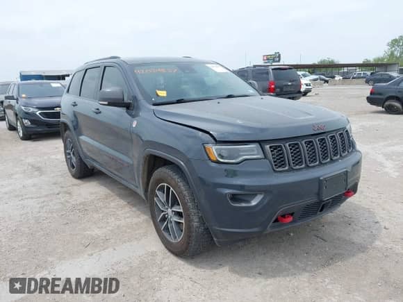 2017 Jeep Grand Cherokee Trailhawk z VIN 1C4RJFLT2HC707592, wystawiony jako IAAI lot #42034837 z przebiegiem 85 853 mil mil oraz . Historia ofert i sprzedaży dostępna na DreamBid. Obrazek 1.