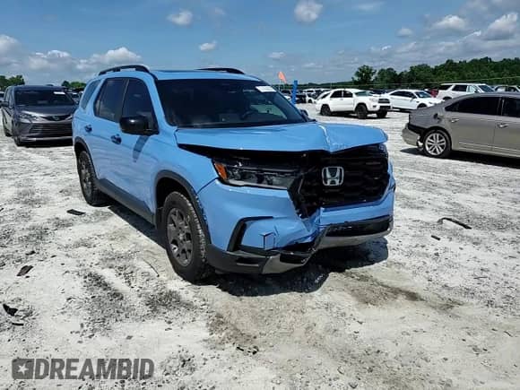 2024 Honda Pilot TrailSport с VIN 5FNYG1H65RB023902, выставлен на аукционе Copart как лот 61254595 с пробегом 21 873 миль миль и Списание • Salvage title. История ставок и продаж доступна на DreamBid. Изображение 14.