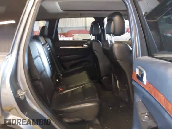 2012 Jeep Grand Cherokee Limited z VIN 1C4RJFBT9CC260334, wystawiony jako IAAI lot #42980030 z przebiegiem 186 641 mil mil oraz . Historia ofert i sprzedaży dostępna na DreamBid. Obrazek 8.