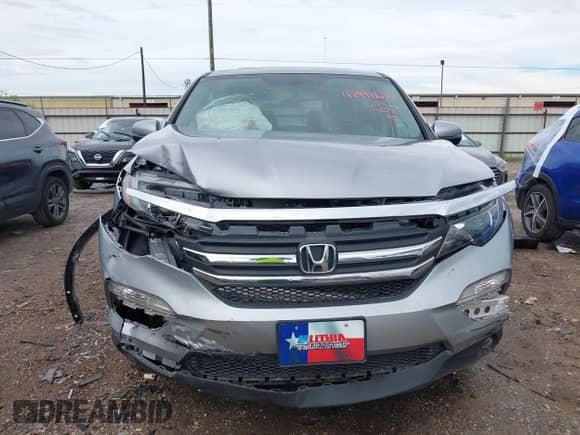 2018 Honda Pilot EX-L z VIN 5FNYF5H52JB013043, wystawiony jako IAAI lot #42498686 z przebiegiem 43 731 mil mil oraz . Historia ofert i sprzedaży dostępna na DreamBid. Obrazek 13.