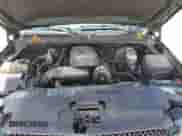 2005 Chevrolet Silverado 1500 Work Truck with VIN 2GCEK19V751279723, listed as a Copart auction lot 63413135 with 303,023 mi miles and Salvage title. Bid and sale history available at DreamBid. Image 11.