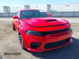 2021 Dodge Charger Scat Pack with VIN 2C3CDXGJ4MH650660, listed as a IAAI auction lot 42309126 with 34,597 mi miles and . Bid and sale history available at DreamBid. Image 1.