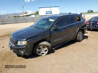 2016 Jeep Grand Cherokee Laredo with VIN 1C4RJFAG2GC425683, listed as a Copart auction lot 80327675 with 197,724 mi miles and Salvage title. Bid and sale history available at DreamBid. Image 1.