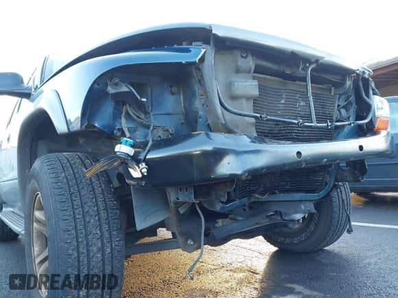 2002 Dodge Durango Sport z VIN 1B4HS38N62F206645, wystawiony jako IAAI lot #41216499 z przebiegiem 149 694 mil mil oraz . Historia ofert i sprzedaży dostępna na DreamBid. Obrazek 6.