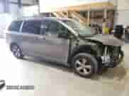 2011 Toyota Sienna LE with VIN 5TDKK3DC1BS033095, listed as a Copart auction lot 61135465 with 317,340 mi miles and Clean title. Bid and sale history available at DreamBid. Image 4.