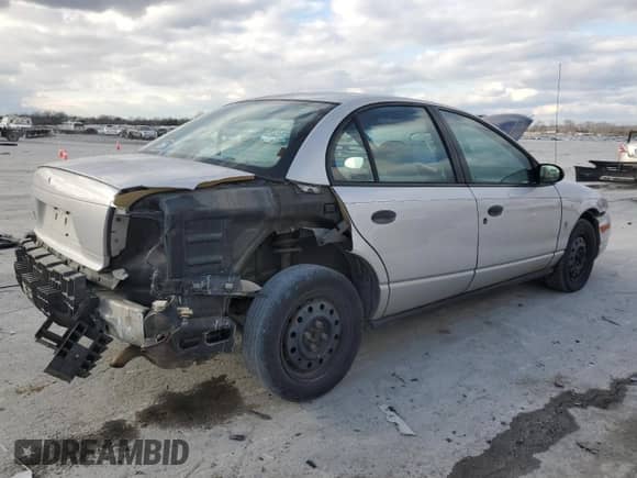 2000 Saturn SL z VIN 1G8ZH5285YZ230599, wystawiony jako Copart lot #42386685 z przebiegiem 328 710 mil mil oraz Czysty tytuł • Clean title. Historia ofert i sprzedaży dostępna na DreamBid. Obrazek 3.