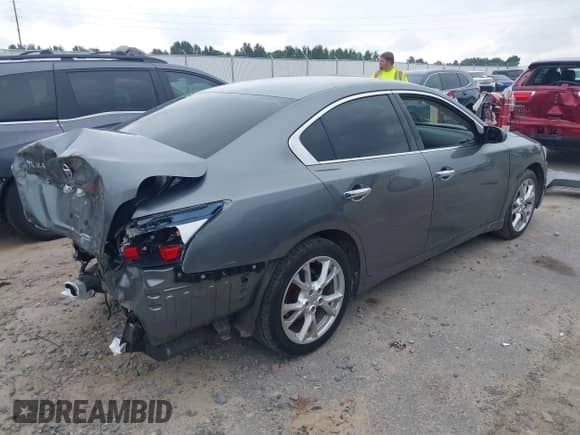 2014 Nissan Maxima SV z VIN 1N4AA5AP6EC488005, wystawiony jako IAAI lot #42894857 z przebiegiem 93 618 mil mil oraz . Historia ofert i sprzedaży dostępna na DreamBid. Obrazek 4.