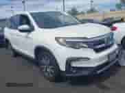 2019 Honda Pilot EX-L with VIN 5FNYF6H54KB047279, listed as a IAAI auction lot 43281886 with 122,627 mi miles and . Bid and sale history available at DreamBid. Image 1.