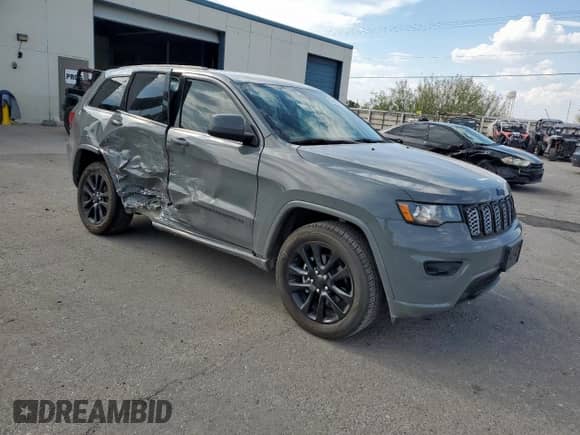 2019 Jeep Grand Cherokee Altitude with VIN 1C4RJEAG5KC805491, listed as a Copart auction lot 68686785 with 112,545 mi miles and Salvage title. Bid and sale history available at DreamBid. Image 4.