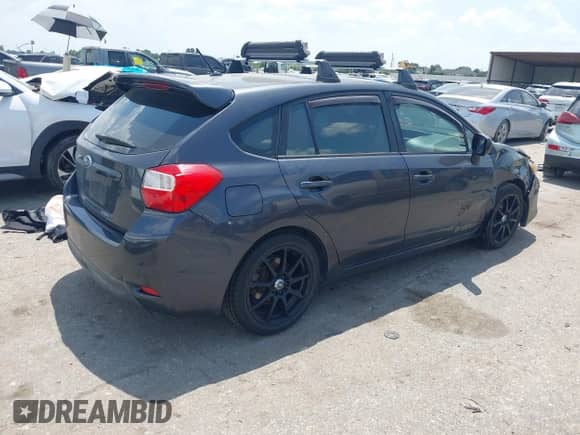 2013 Subaru Impreza Premium with VIN JF1GPAC66DH828440, listed as a IAAI auction lot 42974874 with 133,142 mi miles and . Bid and sale history available at DreamBid. Image 4.