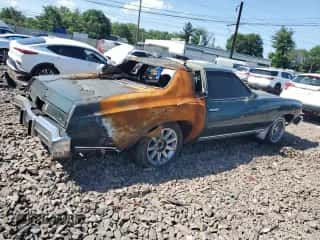 1974 Chevrolet Monte Carlo z VIN 1H57H4B427405, wystawiony jako Copart lot #60427925 z przebiegiem Nie podano mil oraz Szkoda całkowita • Salvage title. Historia ofert i sprzedaży dostępna na DreamBid. Obrazek 3.