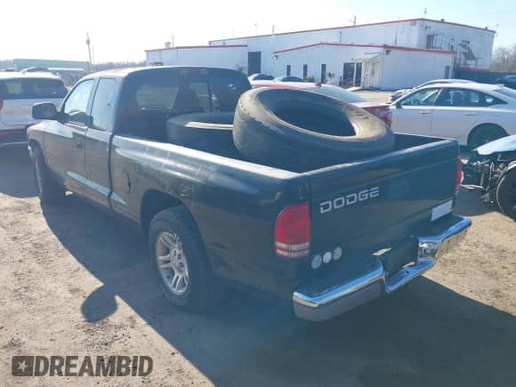 2001 Dodge Dakota with VIN 1B7GL22X11S307842, listed as a IAAI auction lot 41484381 with 154,012 mi miles and . Bid and sale history available at DreamBid. Image 3.