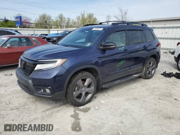 2021 Honda Passport Touring with VIN 5FNYF8H99MB042984, listed as a Copart auction lot 52858975 with 35,308 mi miles and Salvage title. Bid and sale history available at DreamBid. Image 1.